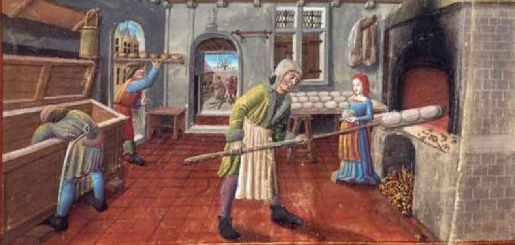 Boulangers à la fabrication du pain. Missel franciscain, 1450-1500. Bibliothèque Municipale de Lyon