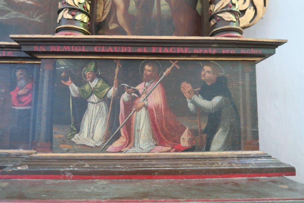 Photo d'une partie de la prédelle du retable de Claude Bassot (1625) : Saint Rémi, Saint Claude et Saint Fiacre.